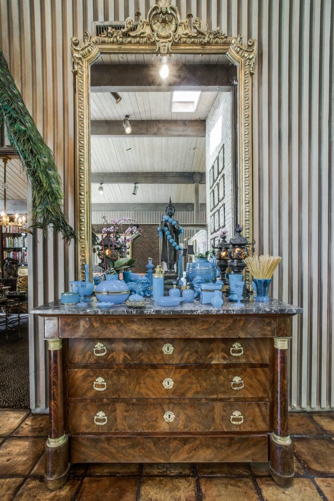 Nineteenth-century French opaline glass collection. Antique Empire-era chest from France.