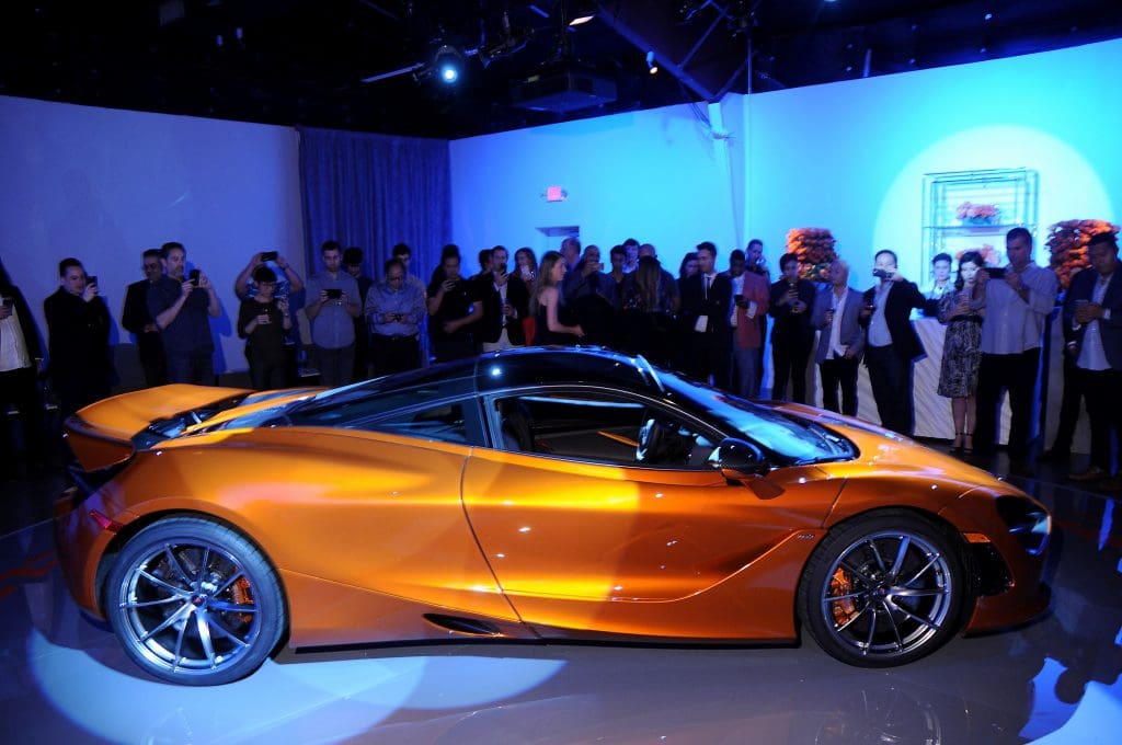 Guests view  the new McLaren 720s at the McLaren Houston unveiling party at 5226 Elm Thursday March 16,2017. (Dave Rossman Photo)