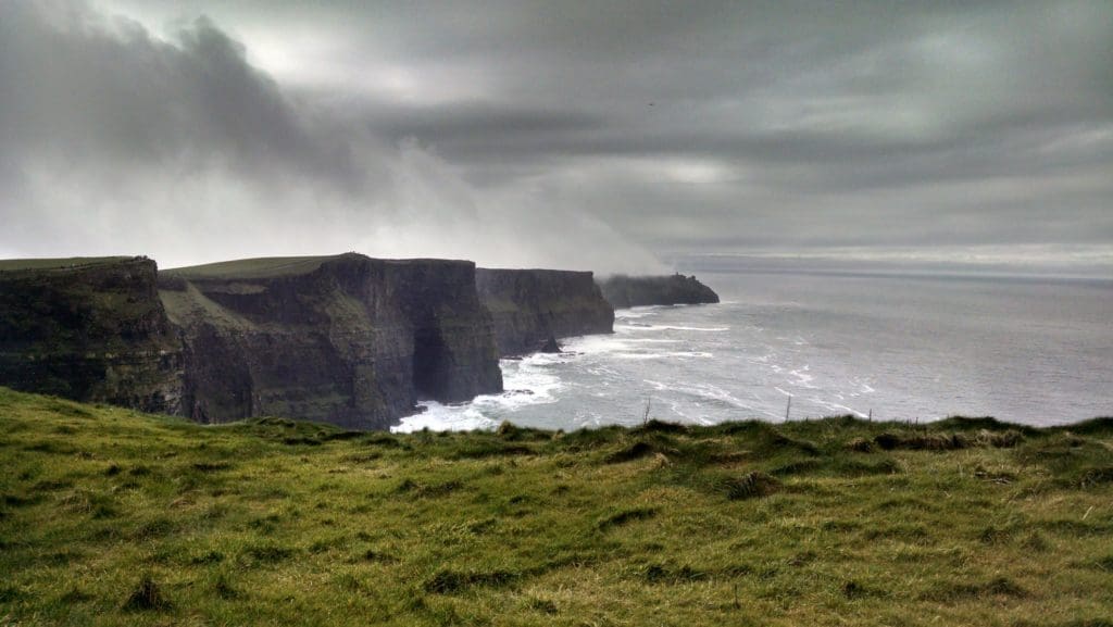 My Real-Life Engagement Fairytale: Young Houston Couple Finds Love Amid the Cliffs and Castles of Ireland