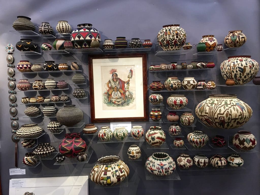 Exhibitor Really Good of Panama City Panama showing a wall of Indian baskets