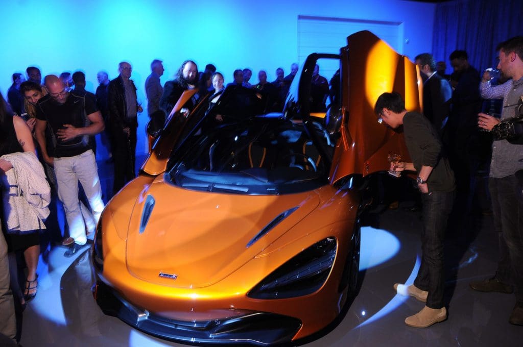 Guests view  the new McLaren 720s at the McLaren Houston unveiling party at 5226 Elm Thursday March 16,2017. (Dave Rossman Photo)