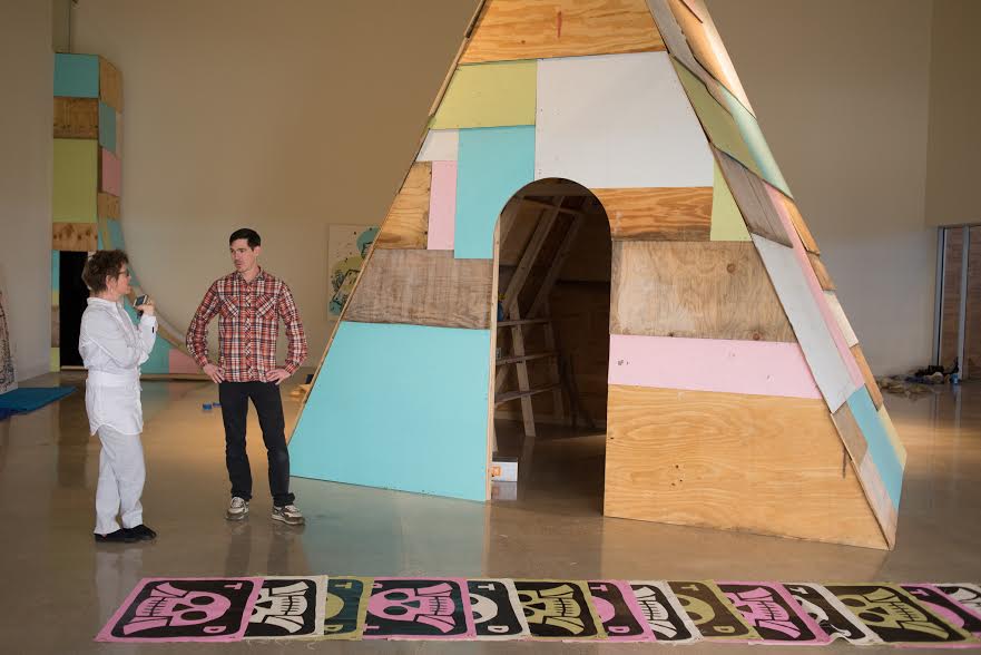 Art City interim executive director Jade Walker, most recently director of UT's Visual Arts Center, adds a lot to the equation. Shown: Walker with Michael Sieben at the artist's 2014 solo at the VAC.