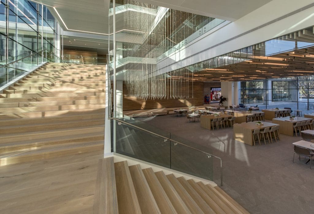 An oak-and-glass staircase
connects three levels of the new Perot family headquarters. (Photo by Erika Edwards)