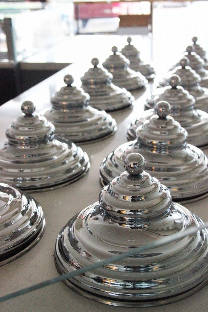 Dolce Neve's gelato is stored in closed silver containers, which is the mark of an authentic gelateria. 