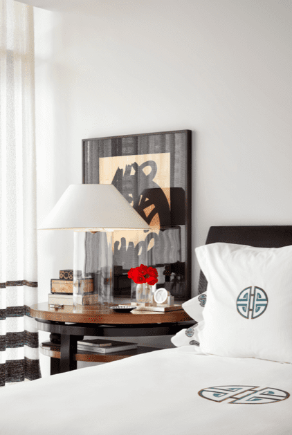 In Nash’s bedroom is a Cameron Privè bed with leather headboard. Hamburg House linens and Meyerland console, both from George Cameron Nash. Japanese 19th-century woodblock.
Vintage John Saladino lamp.