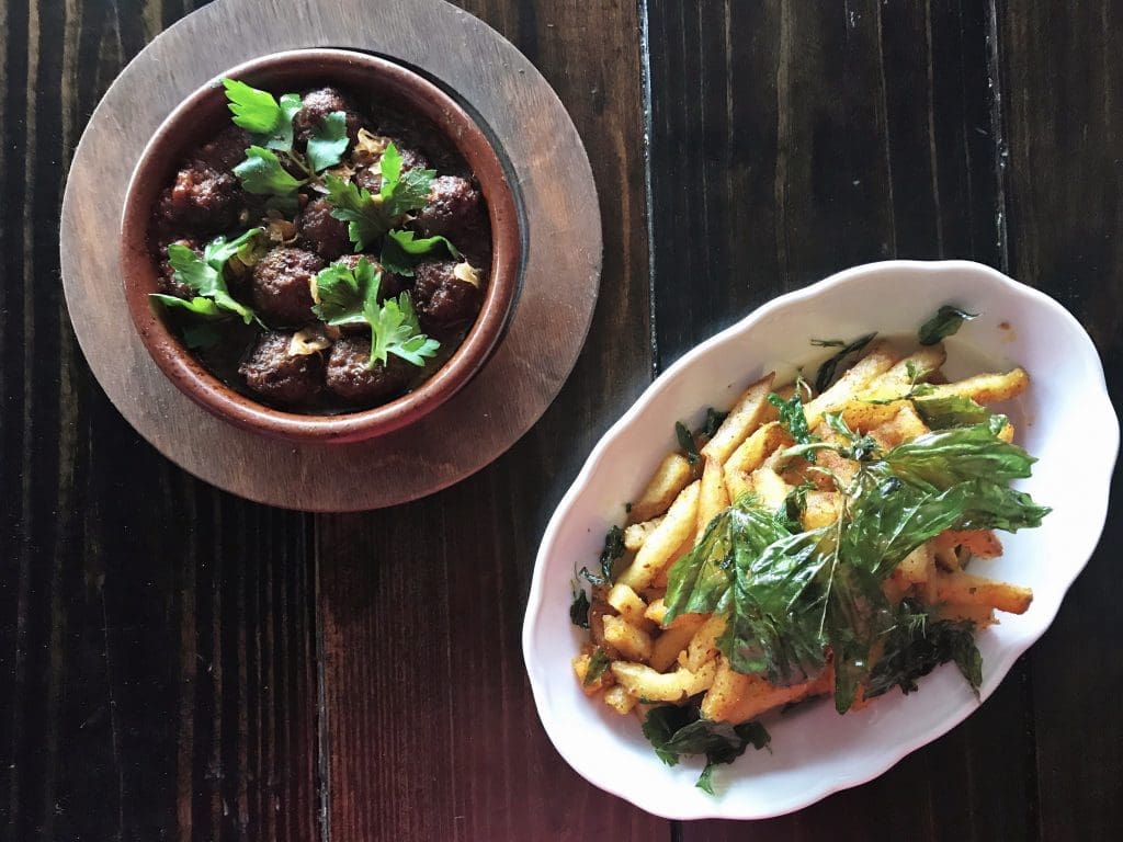 Delicate meatballs and Greek fries at the new Helen in the Heights. 