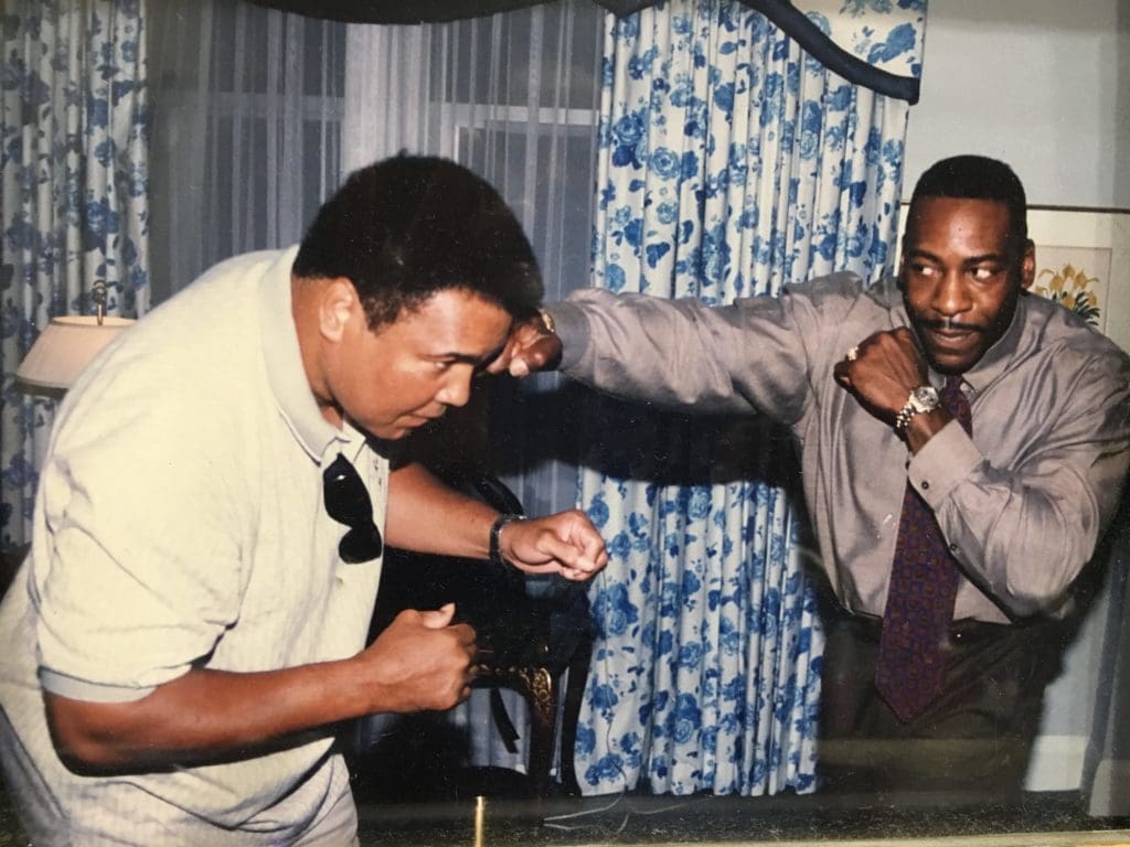 Booker T shared a moment — and friendly fisticuffs — with Muhammad Ali, seen here in a photo printed in the first issue of Found Me.