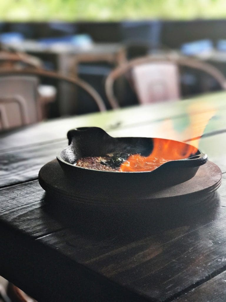 Flaming cheese at Helen in the Heights
