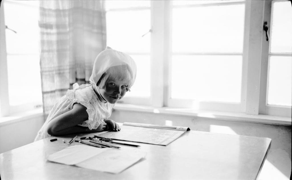 The artist as a child, at home in Te Ahora, New Zealand, circa 1959. Her family's respect and stewardship of her drawings has been vital to their acclaim. (Photo Doug King) 