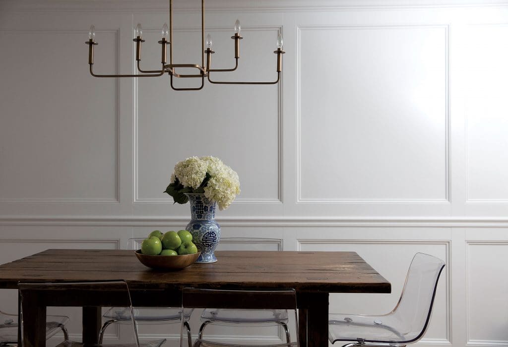 In the breakfast room, custom paneling, Restoration Hardware table, IKEA chairs. Kichler chandelier.