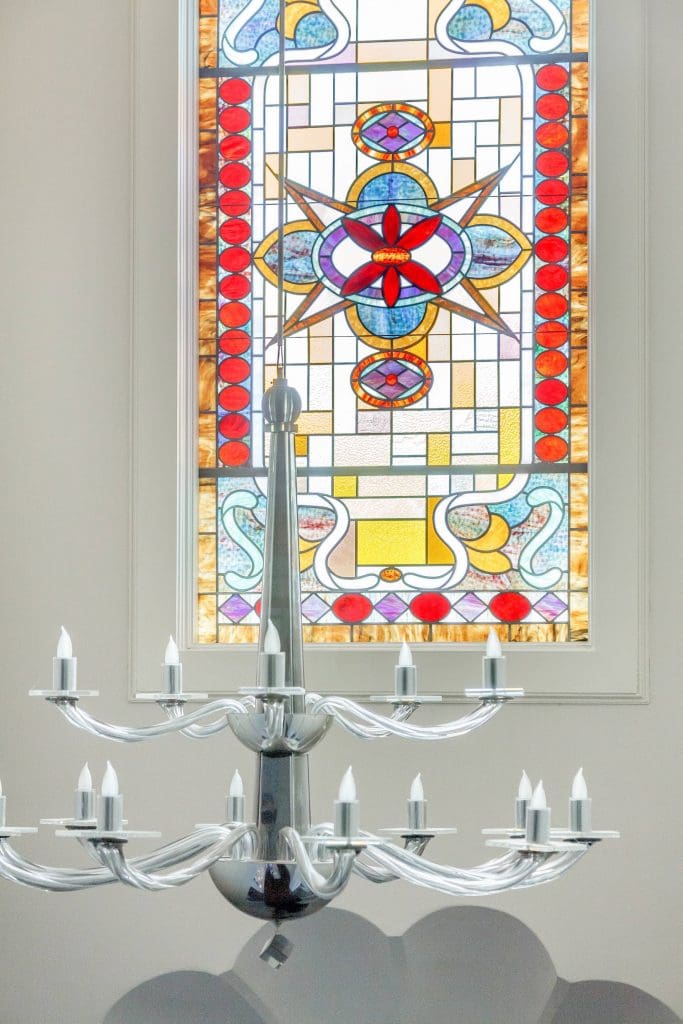 The stained glass windows were custom made by a local artisan. 