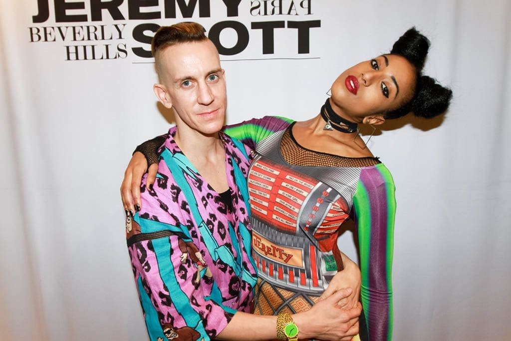 Daring Designer Pushes the Envelope with Teasing Pinups for Moschino: Watch it Live