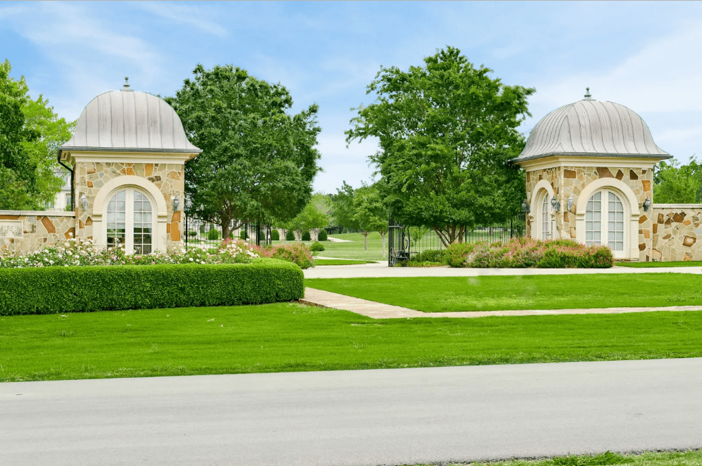 The palace mansion comes with a large guest house and a 20-car garage.