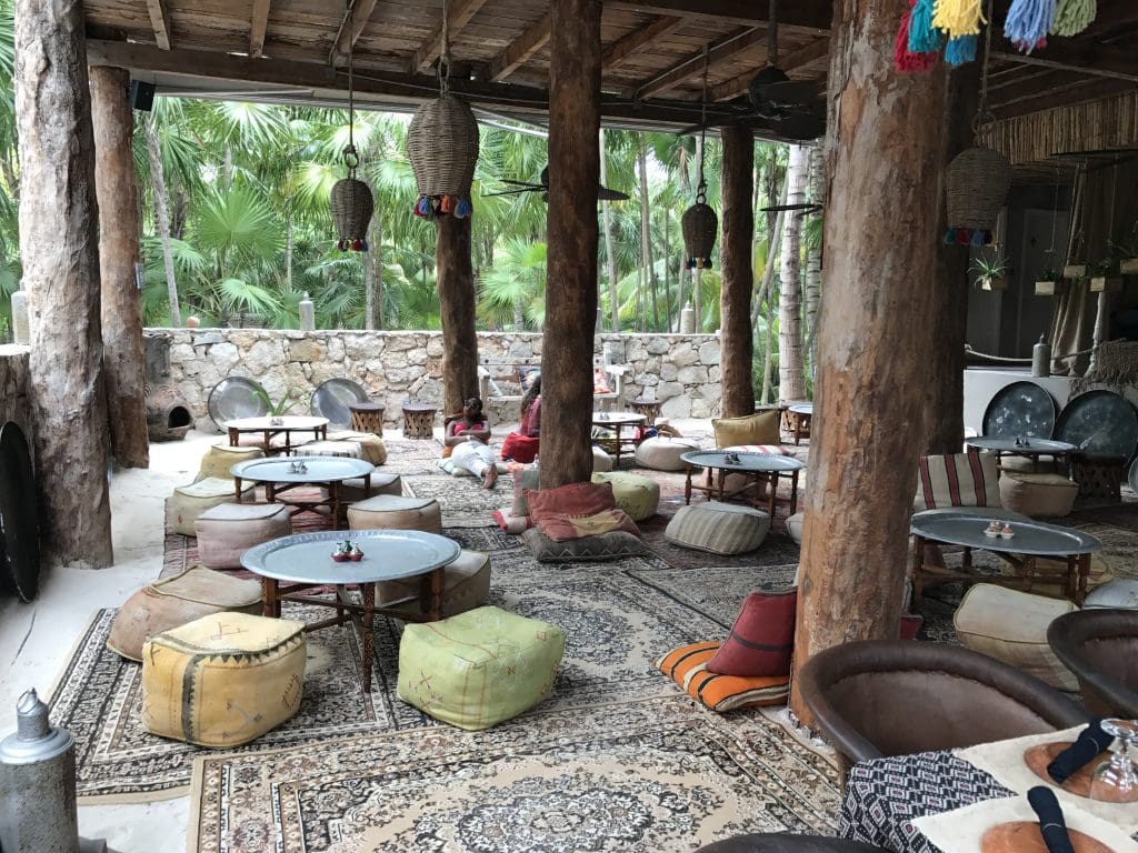 The gorgeous restaurant at Nomade is a jungle oasis. 