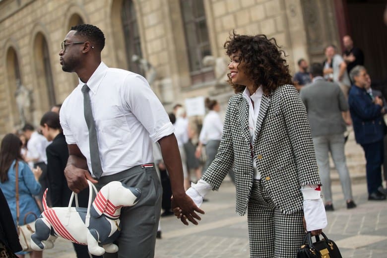 Dwyane Wade carries a Thom Browne tote bag during Mens Paris Fashion Week.