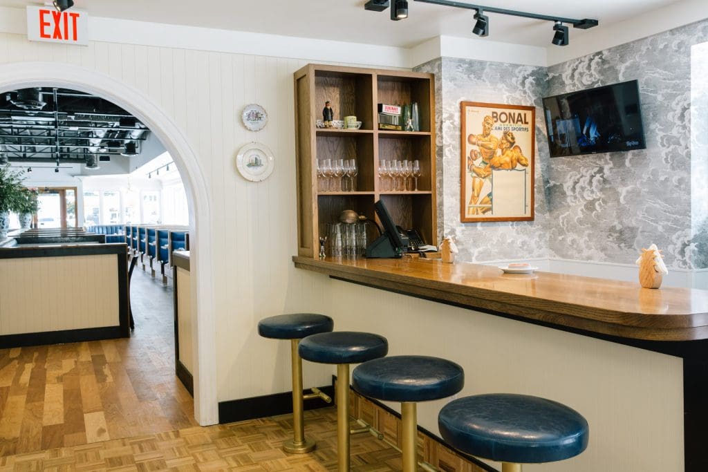 Waiting for a table or a to-go order? Snag one of the four seats at Jack's Bar in the back (Photo by Kelsey Foster)
