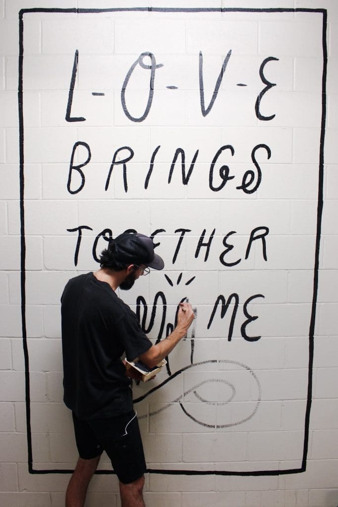 Kyle Steed finishes up a piece