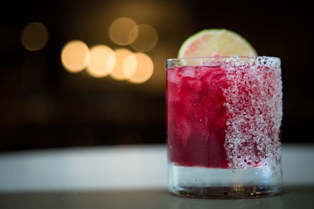 Stagecoach Inn beverage Director Topher White helps mix new drinks like the hibiscus margarita. 