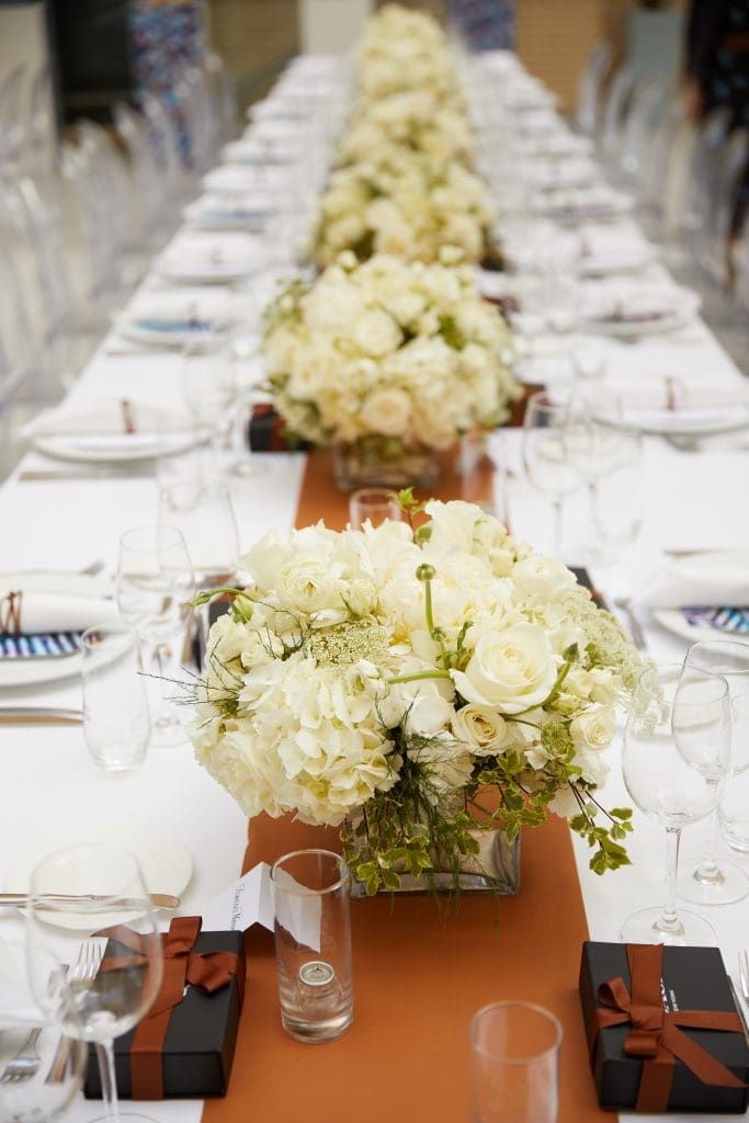 Leather on leather for Coach's tabletop