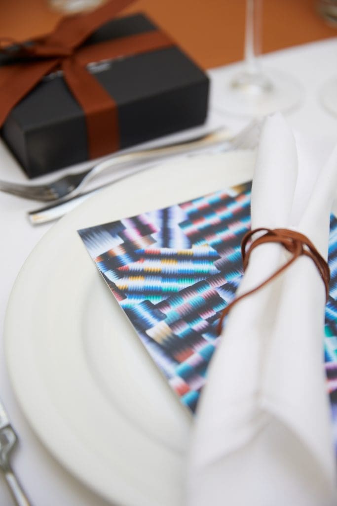 Arthur Pena's art bedecking the menu