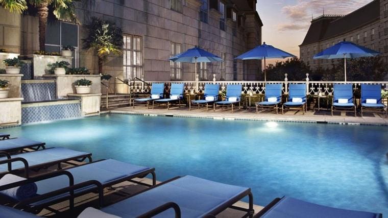 Hotel Crescent Court welcomes spa pass holders to use the serene pool. 