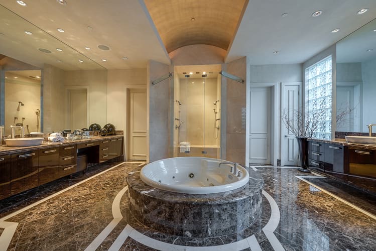 A round tub is the centerpiece of the master bathroom. 