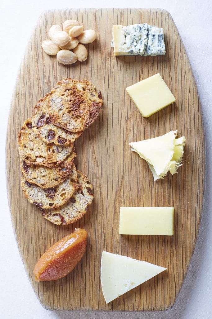 Enjoy bites at the bar like the artisan cheese board.