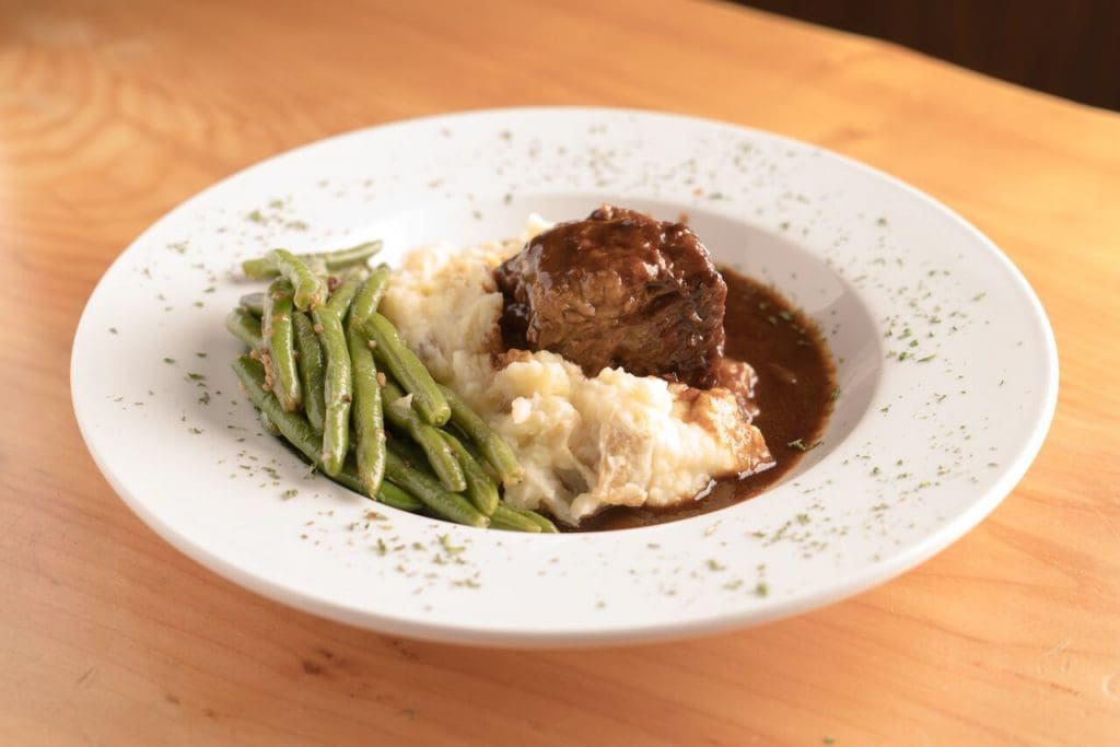 The braised beef short rib is incredibly flavorful and tender. 
