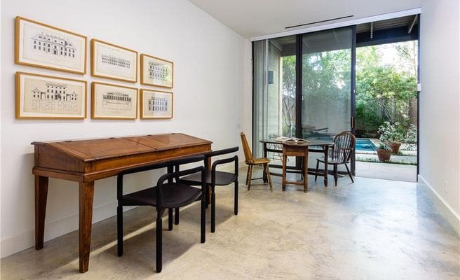 An office space downstairs opens to the tranquil backyard. 