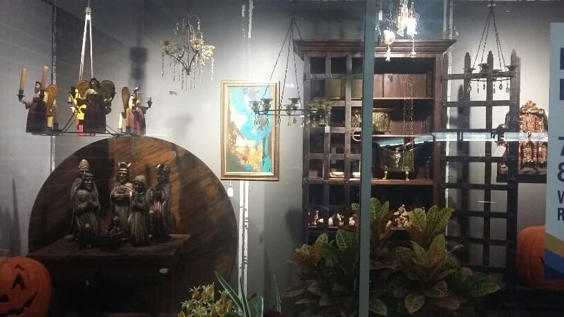 The night before the Cooley estate sale begins, a detail of a window at the River Oaks Shopping Center