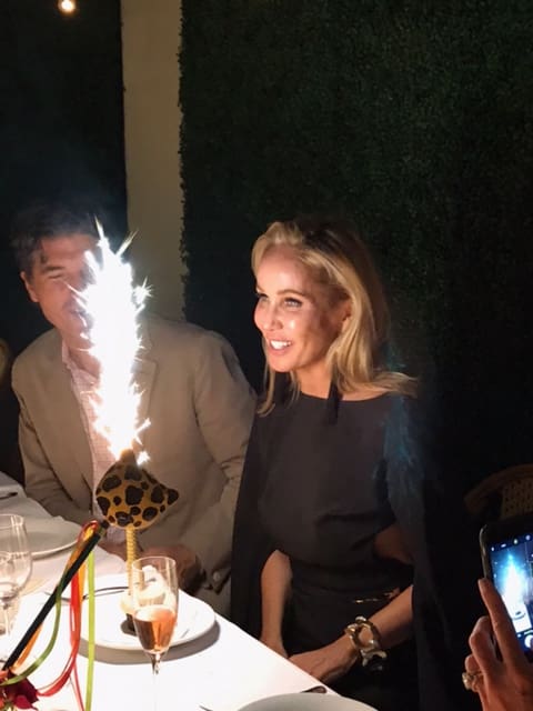 Brooke Davenport blows out the sparkler at her Le Bilboquet birthday dinner