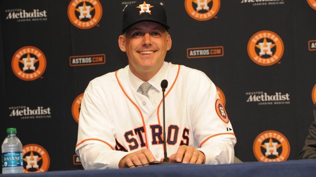 Astros manager A.J. Hinch says his family got doused with beer by New York Yankee fans.
