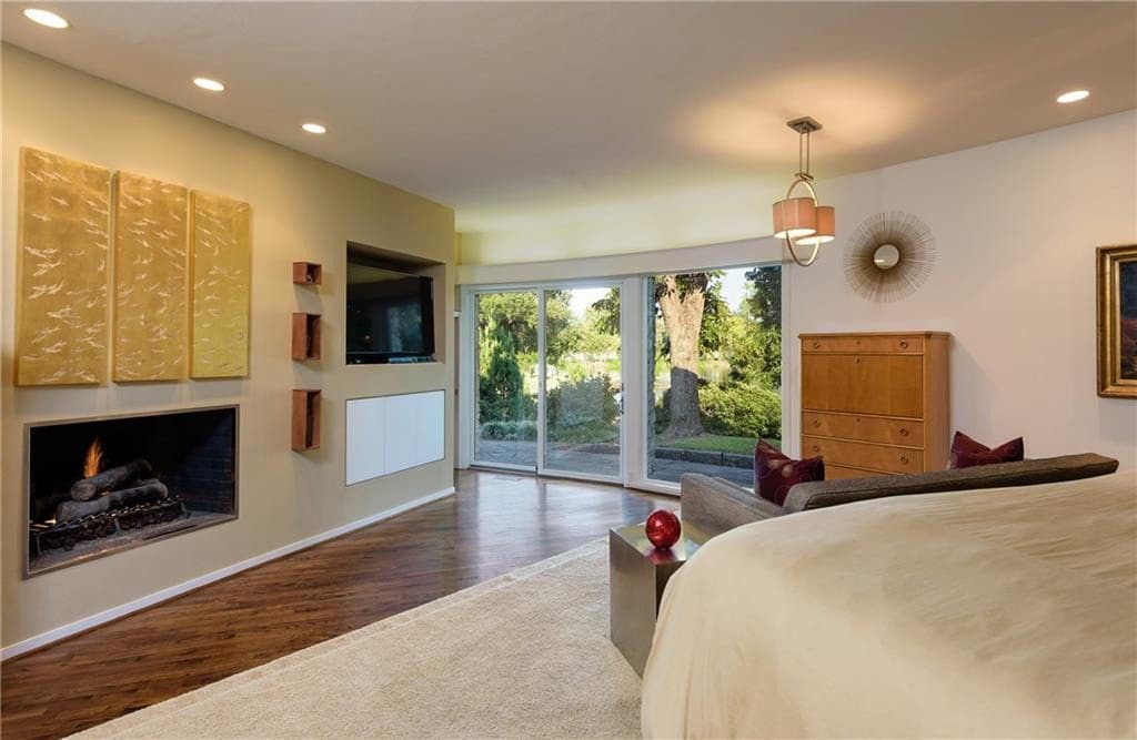 The house has three bedrooms and additional guest quarters. 