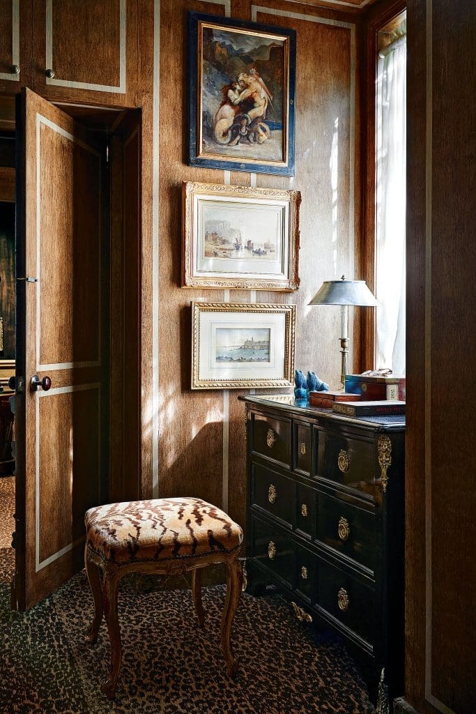 Kevin Peavy's dressing room with French 19th-century bench in Old World Weavers tiger velvet. Chest from Joseph Minton Antiques, 19th century.