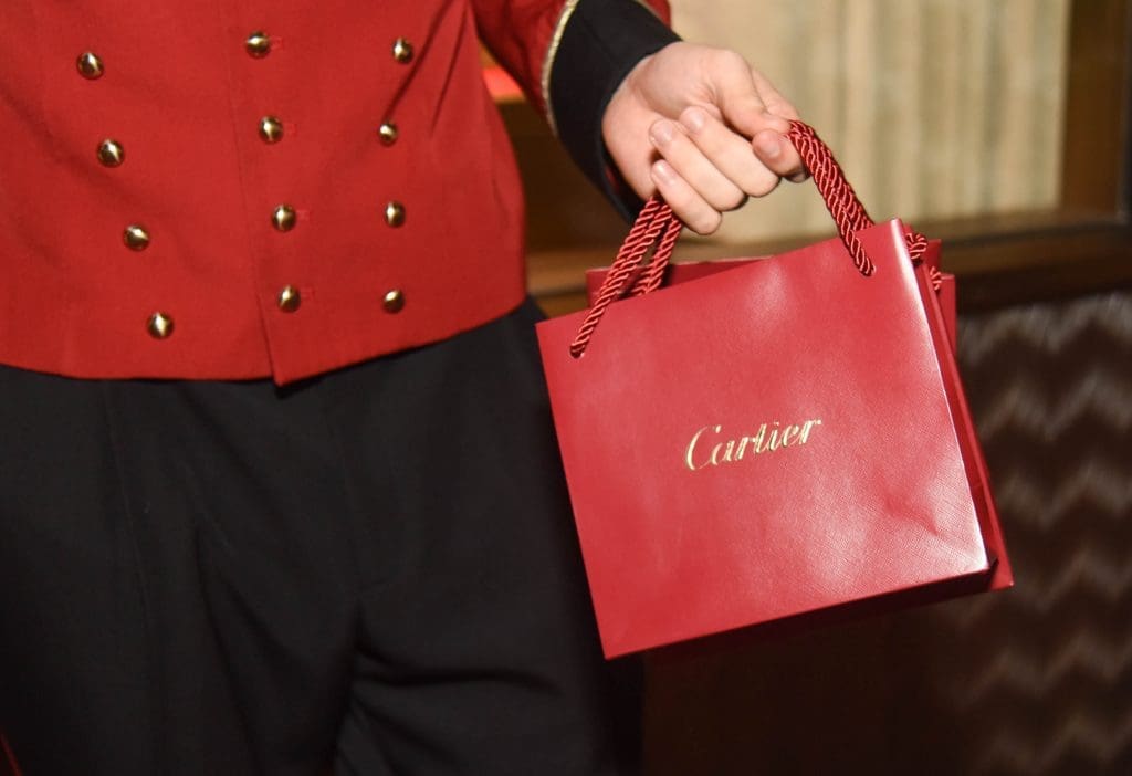 Guests left with petite Cartier gift bags.