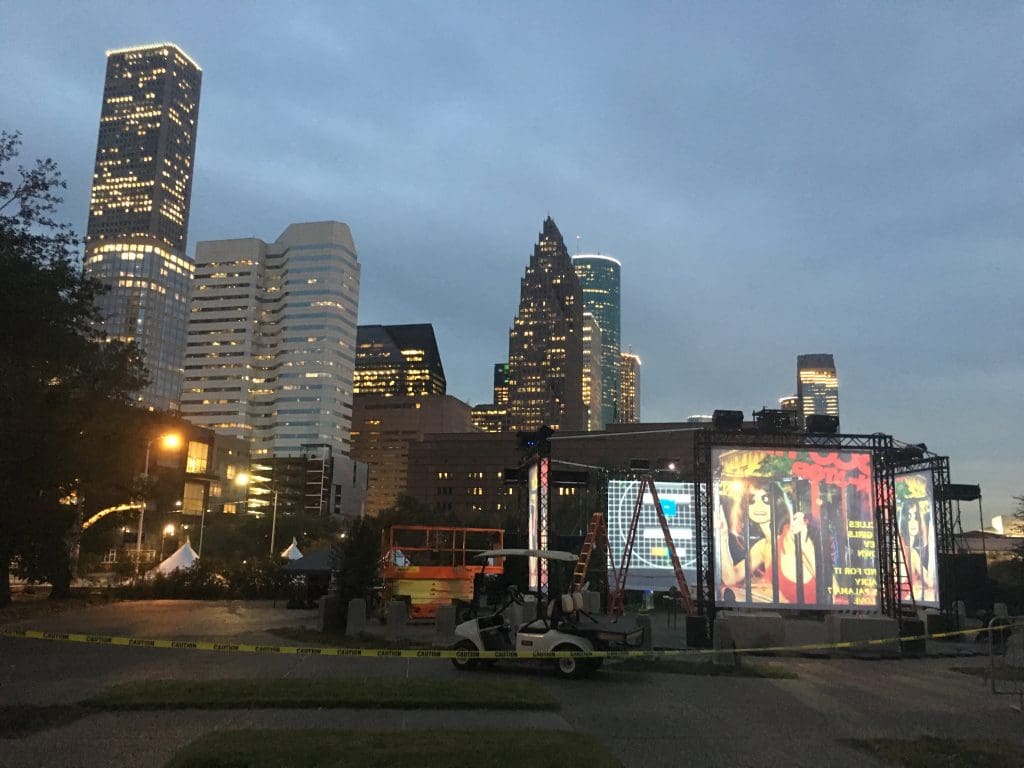 This outside art installation is set against the downtown skyline. 