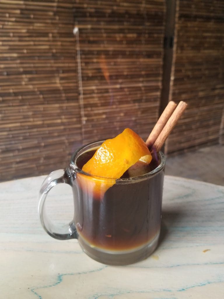 Hot coffee and alcohol means double the trouble in Double Trouble Caffeine & Cocktail's Flaming Coffee Grog. 