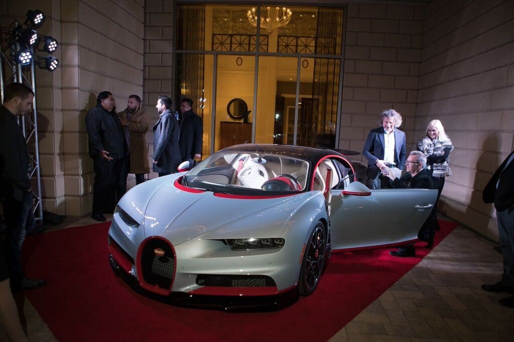 The Bugatti Chiron caused a stir parked outside of the Residences at The Stoneleigh. 