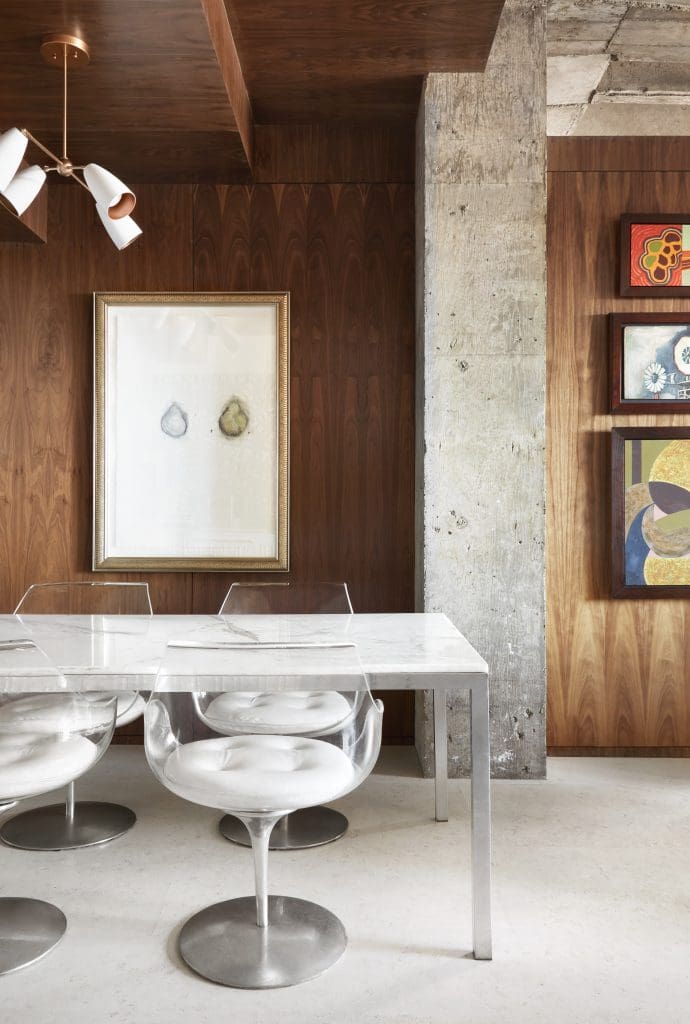 Custom walnut wall and ceiling designed by Bentley Tibbs. Andrea Rosenberg’s Pears, 1994. Light fixture from Land of Nod. 