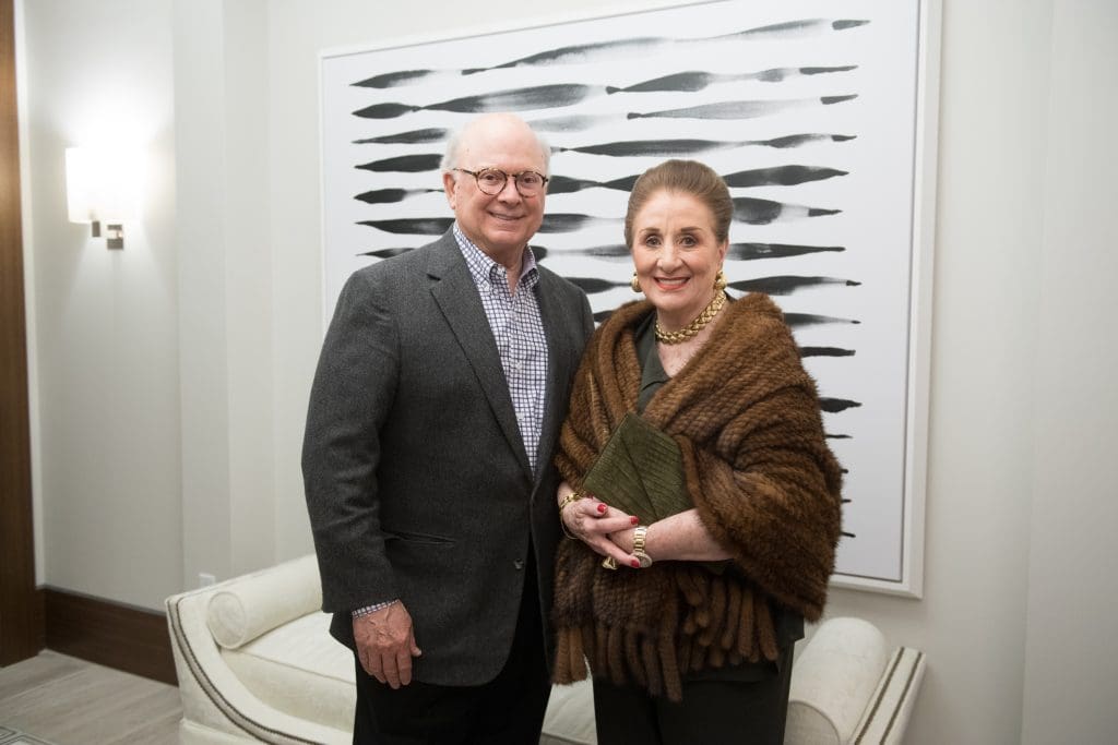 Martha Turner with her husband, Glenn Bauguss, at The Wilshire opening in 2018 in a fur shawl that will be for sale this weekend. (Photo by Daniel Ortiz)