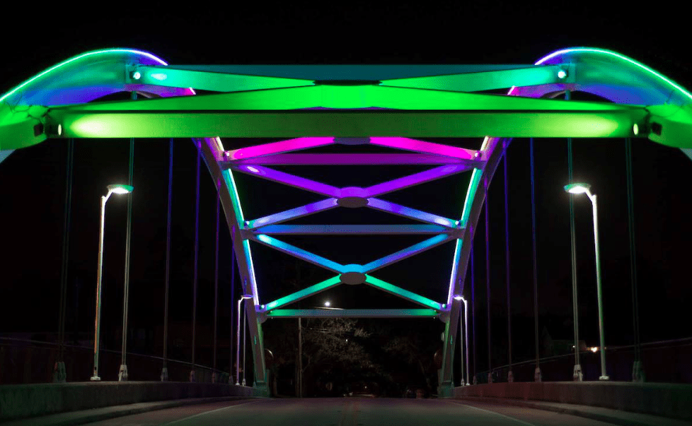 Southwest Freeway’s Light-Up Bridges Shine On Despite a Fierce Legal Fight: Charitable Contributions Keep the Colorful Bridges’ Electricity On (For Now)