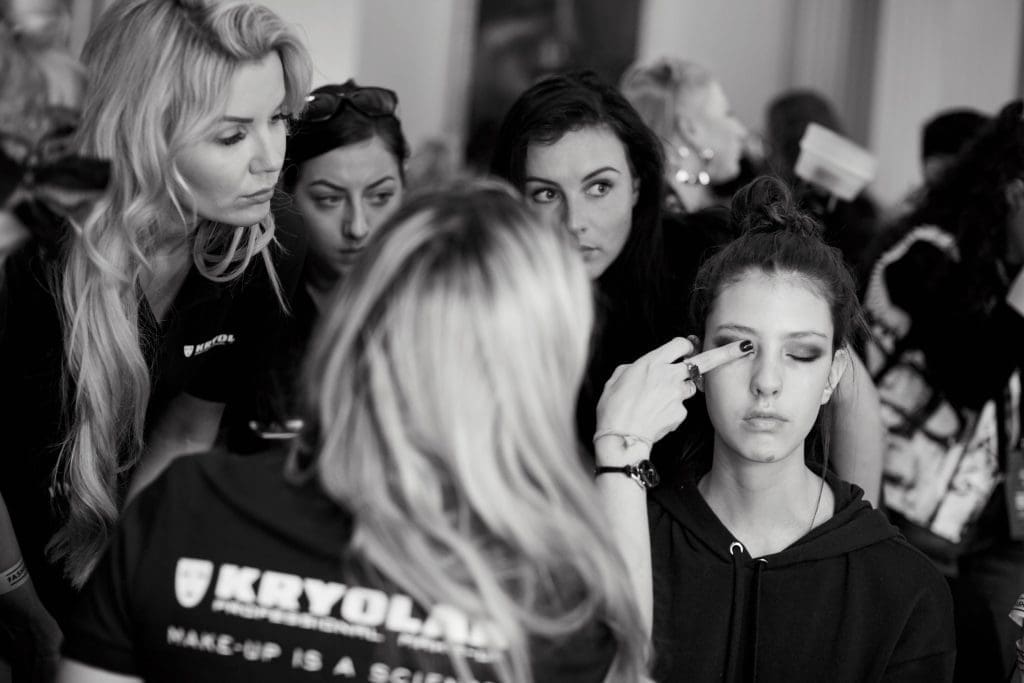 Makeup artistry paired with Garza's artistry.
