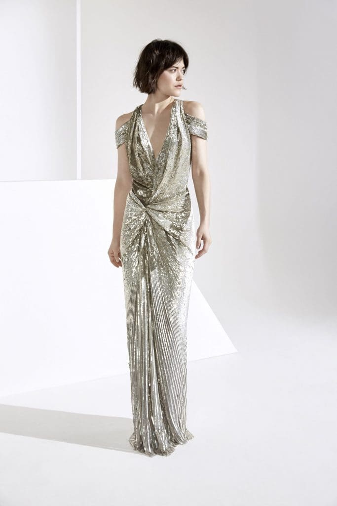 Jenny Packham metallic sequin draped cold shoulder gown.