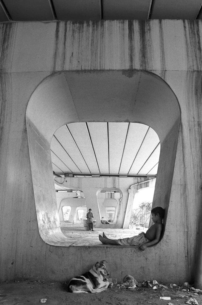 Vicky Roy’s "Ravi, Seven Years Old, Begging for a Living near Indian Institute of Technology Flyover, New Delhi," from the series “Street Dreams,” 2005 - 2008, at FotoFest