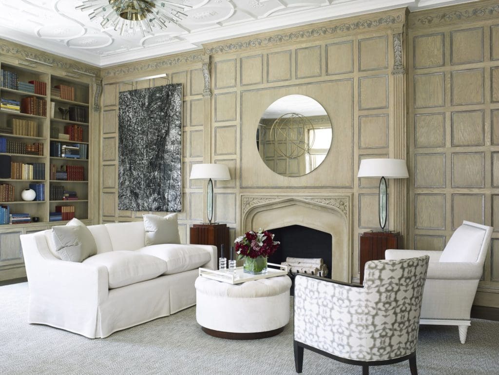 In the living room, custom sofa and lounge chair by Anthony Lawrence-Belfair. Lamps by Roberto Rida from Bernd Goeckler Antiques. Clients’ own ebonized wood-frame chair, upholstered in Donghia silk. Mirrored wall sculpture, Olafur Eliasson’s Your Orbit Attention, 2013. Painting, Angel Otero’s Untitled, 2012.