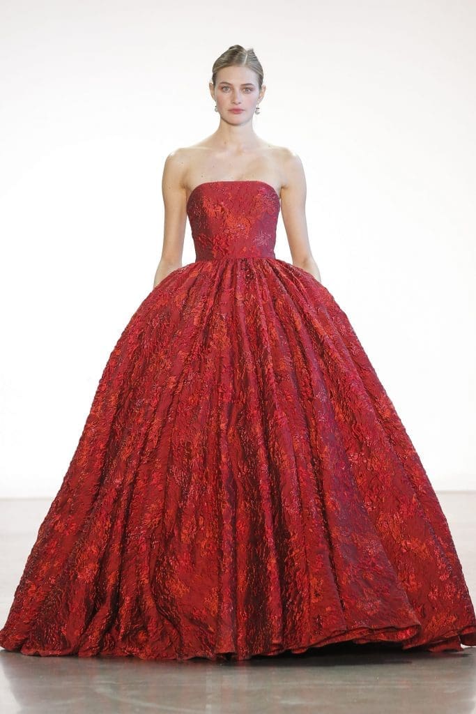 Badgley Mischka crimson silk and lurex brocade evening gown with full skirt.