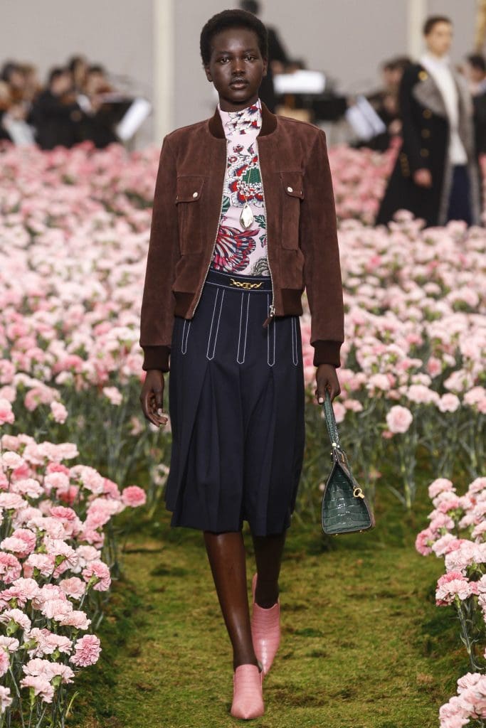 Tory Burch suede bomber jacket, "Happy Times" pattern cotton sweater, bi-stretch wool skirt.