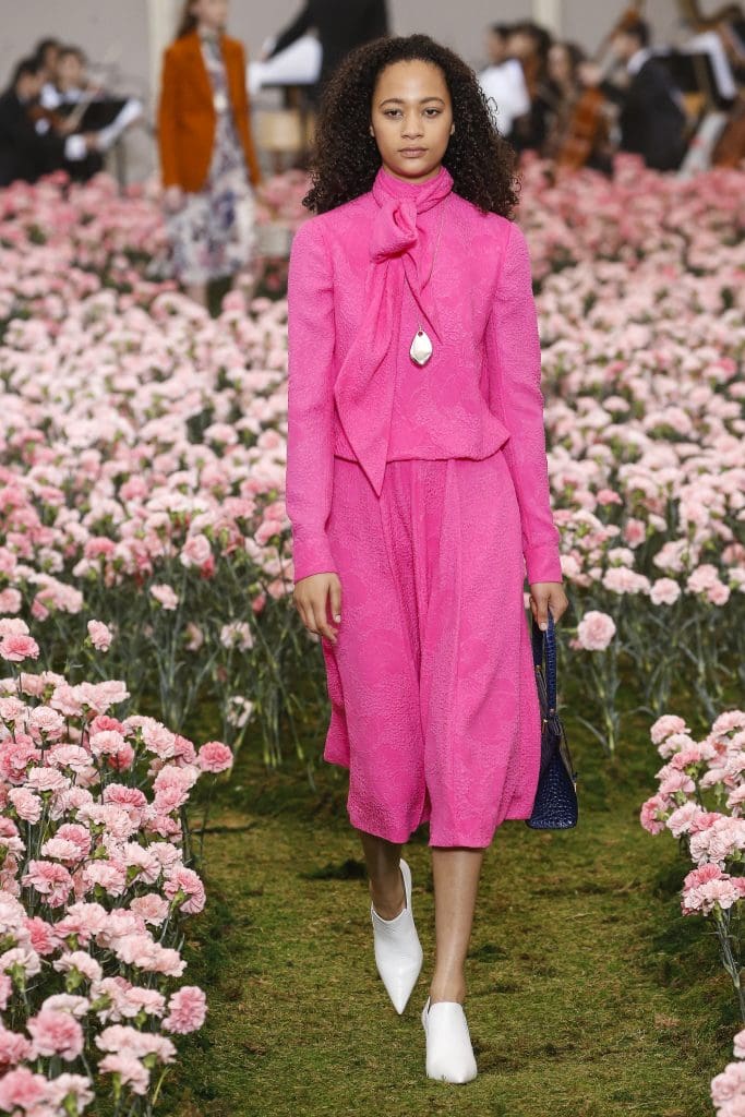 Tory Burch fuchsia dress stands out in her fall 2018 collection.
