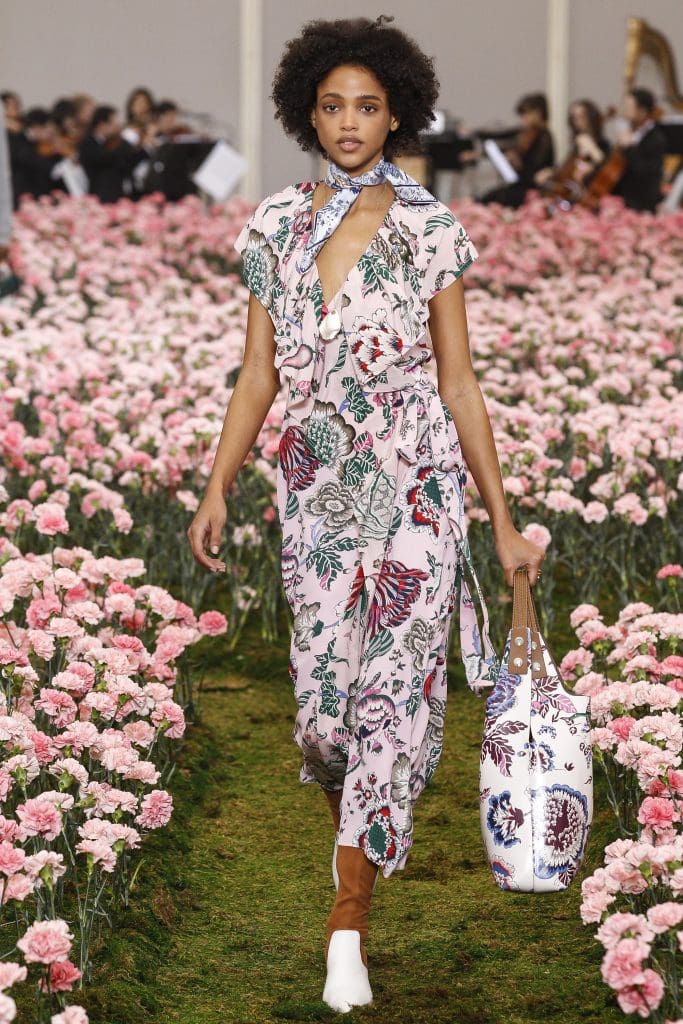 Tory Burch "Happy Times" print viscose crepe wrap dress and matching tote bag, with pointed-toe high heel bootie.
