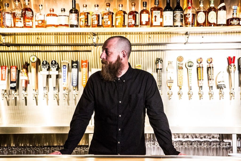 Cody Hastings loves seeing "people enjoy the beers we picked and the whiskeys that we like to drink." 